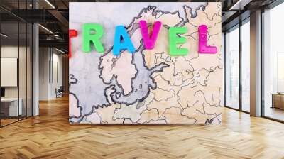 Colorful word Travel on World map background Wall mural