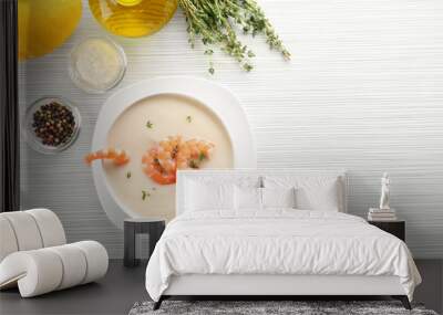 Composition with yummy shrimp cream soup on wooden table Wall mural