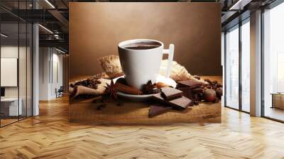 cup of hot chocolate, cinnamon sticks, nuts and chocolate Wall mural