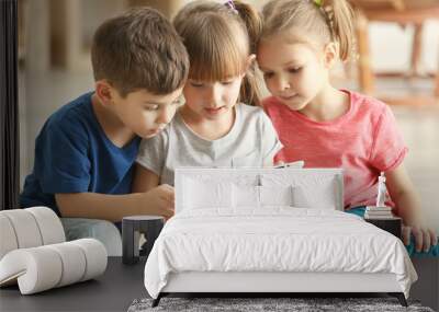 cute kids using digital tablet Wall mural