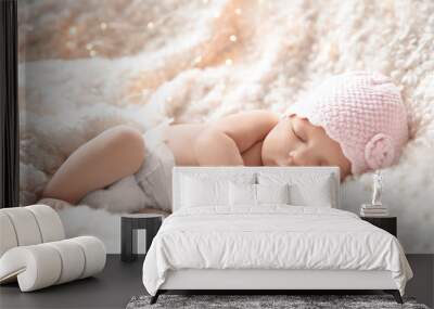 Cute newborn baby girl lying on plaid Wall mural