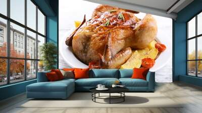 Delicious baked chicken on plate on table close-up Wall mural