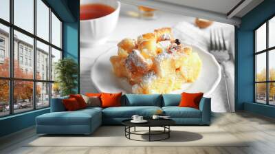 Delicious bread pudding with sugar powder on plate Wall mural