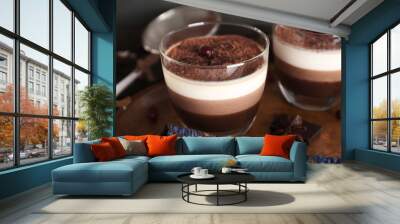 Delicious dessert with chocolate powder and rowan in glass Wall mural