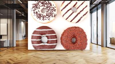 Delicious donuts with icing isolated on white Wall mural