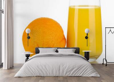 Delicious orange juice in glass and orange next to it isolated Wall mural