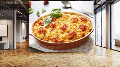 Delicious pasta Al Forno in ceramic bowl on napkin, closeup Wall mural