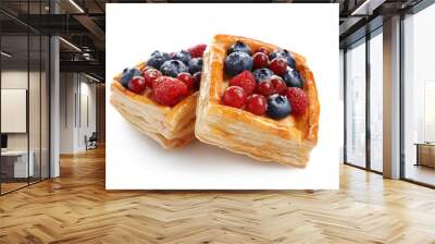 Delicious puff pastries with berries on white background Wall mural