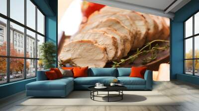 Delicious sliced turkey breast on wooden board Wall mural