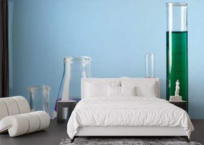 Different laboratory glassware with colorful liquid Wall mural