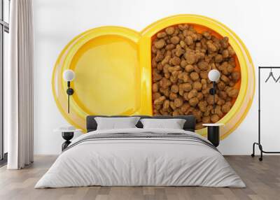 dry cat food and water in yellow bowl isolated on white Wall mural