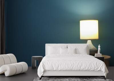 Elegant lamp on table near color wall Wall mural