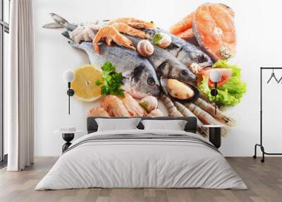 Fresh fish and other seafood isolated on white Wall mural