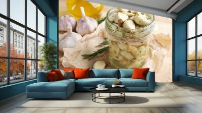 Garlic with spices on wooden table Wall mural