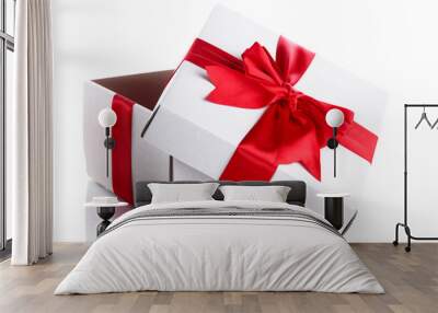 gift box with red ribbon, isolated on white Wall mural