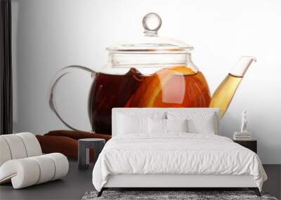 Glass teapot with black tea of orange and cinnamon isolated Wall mural