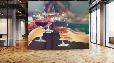 Glasses of wine on a cheerful holiday Wall mural