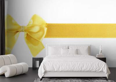 Golden ribbon and bow isolated on white Wall mural