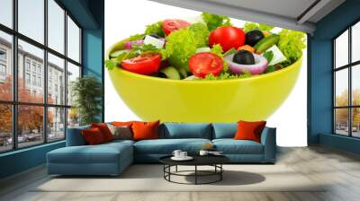 Greek salad on plate isolated on white Wall mural