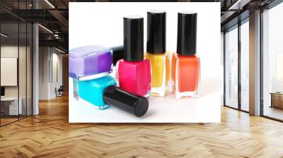 Group of bright nail polishes isolated on white Wall mural