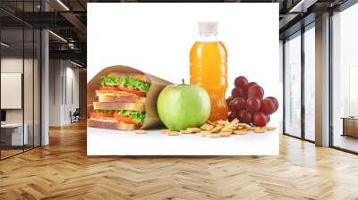 Healthy school lunch with sandwich, fruits and juice isolated on white Wall mural