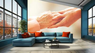 helping hands, care for the elderly concept Wall mural