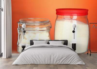 Jar with white crystal sugar and sugar-bowl with white lump Wall mural