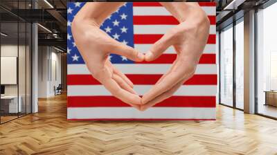 Male and female hands making heart with fingers, isolated on white Wall mural