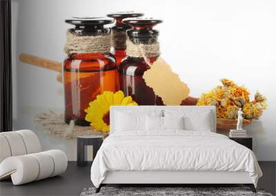 medicine bottles and calendula, isolated on white Wall mural