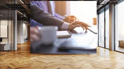 Men working at table in office, closeup. Financial trading concept Wall mural