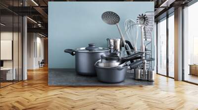 Metal cooking utensils on table Wall mural