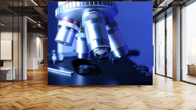 Microscope on color background, close-up Wall mural