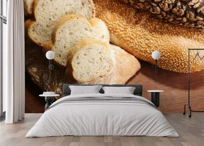 Much bread on wooden board Wall mural