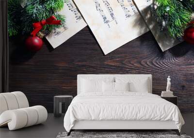 Music and Christmas decor on wooden table Wall mural