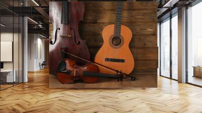 Musical instruments on wooden planks background Wall mural