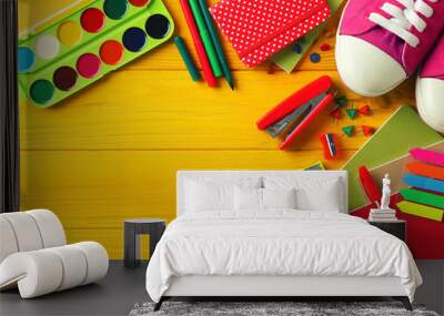 Notebooks and different stationery on wooden background Wall mural