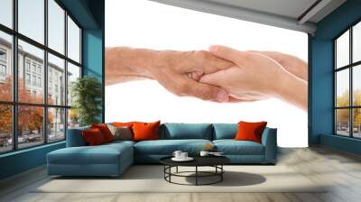 Old male and young female hands on white background Wall mural