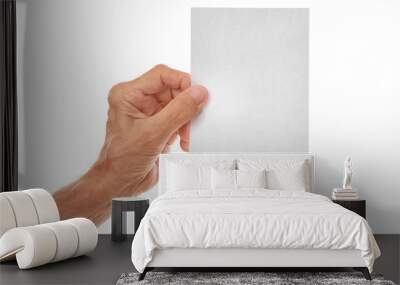 Old man hand holding sheet of paper on a white background Wall mural