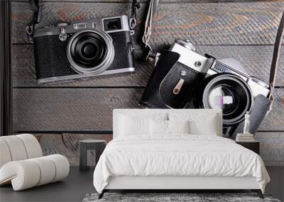 old retro cameras on rustic wooden planks background Wall mural