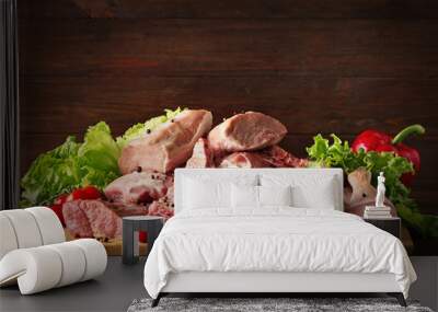 Pieces of different fresh meat on kitchen table Wall mural