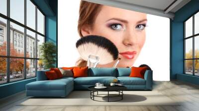 portrait of beautiful woman with make-up brushes, isolated Wall mural