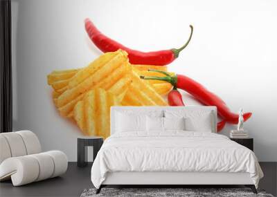 Potato chips and chili peppers on white background Wall mural