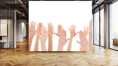 Raised in air hands on white background. Volunteering concept Wall mural