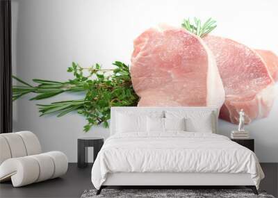 Raw meat steak with herbs isolated on white Wall mural