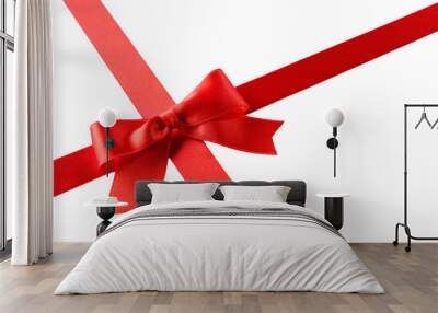 Red ribbon bow  on a white background Wall mural