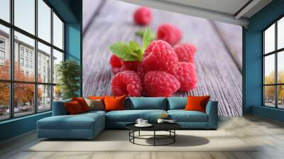 Ripe sweet raspberries on table close-up Wall mural