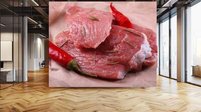 Row beef steak with red chili on paper background Wall mural