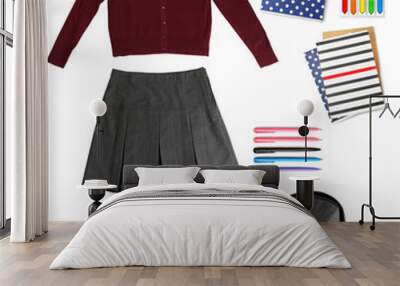 School female uniform with backpack on white background. Fashionable school set concept. Wall mural