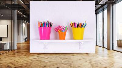 Shelves with stationery in child room close-up Wall mural