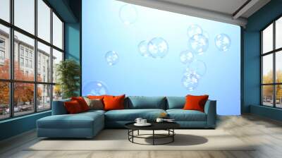 Soap bubble on blue background Wall mural